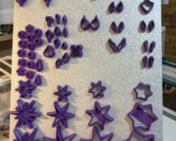 Yay! a stand up space-saving way to display these cutters while I work with them. The magnetic board easily slides into a bookcase when not in use.